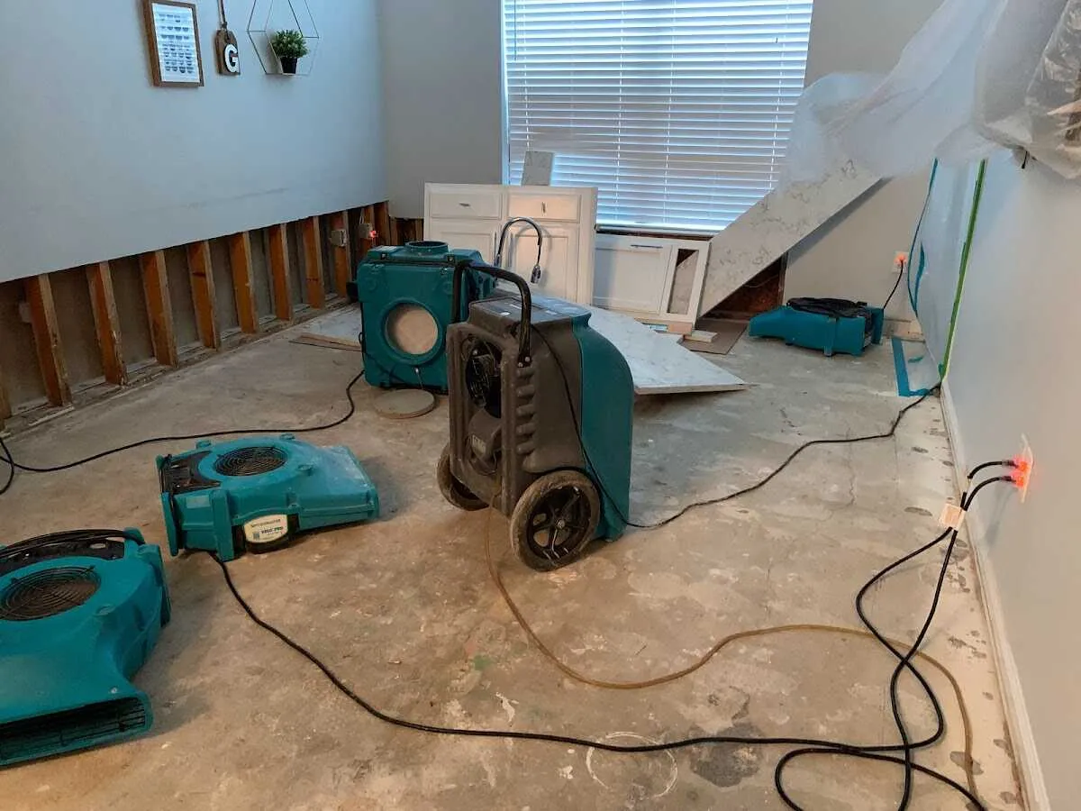 Dehumidifier in flood-cut room for Water Damage Restoration in Northdale